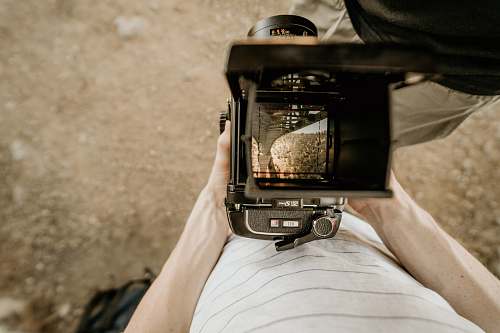 auburn person holding camera while standing on ground foresthill bridge